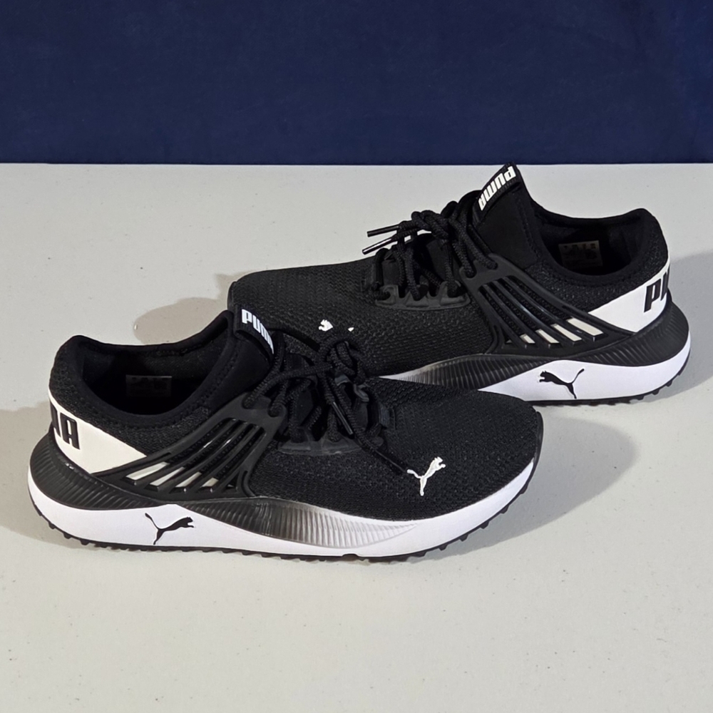 Black and white Puma Soft Foam+ sneakers